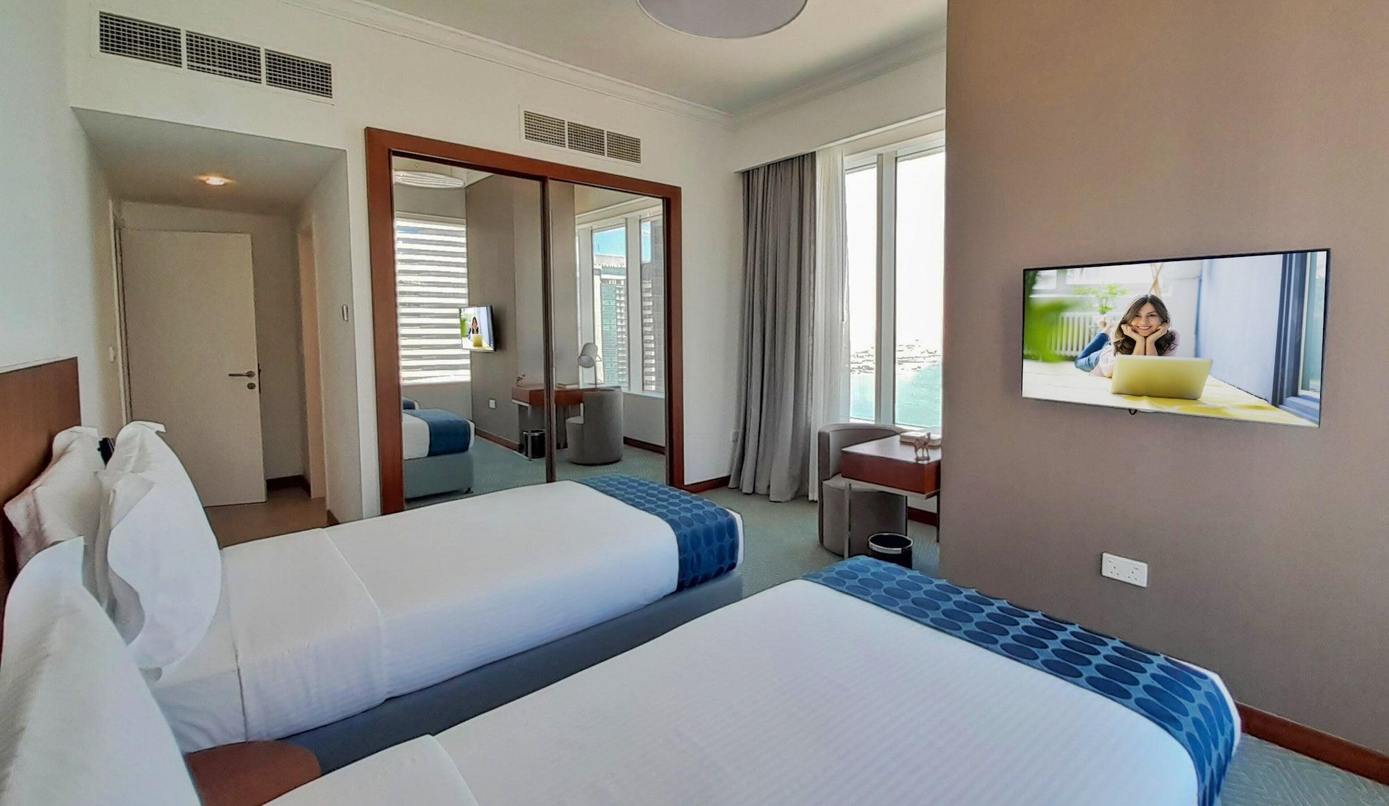 Somerset West Bay Doha Ngoại thất bức ảnh A bedroom at the hotel