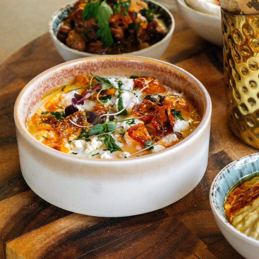 Somerset West Bay Doha Ngoại thất bức ảnh Labneh with olive oil, sumac, and olives